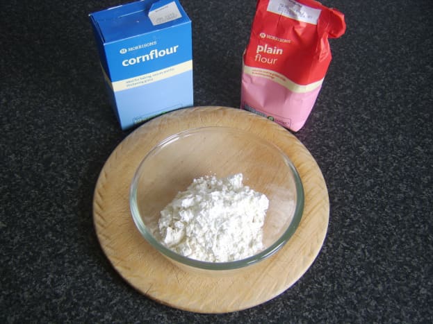 Flour is added to a mixing bowl
