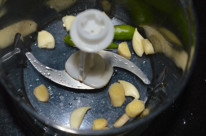 2: Make a paste of ginger, garlic, and green chilies. Set aside.