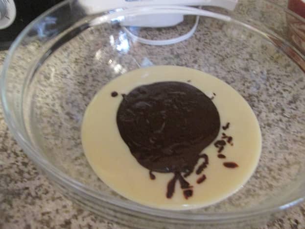 The sweetened condensed milk and melted chocolate.