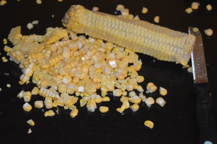 Chopping corn kernels from the cob