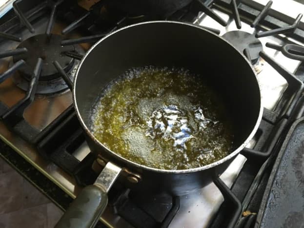 Boil the olive oil, salt, and water.