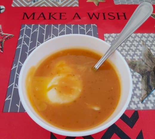 Pumpkin soup with a poached egg