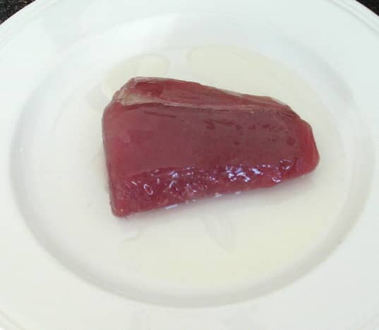 Oiled and seasoned tuna fillet