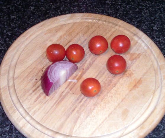 Cherry tomatoes and quarter red onion