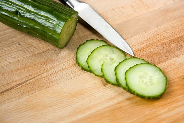 Preparing the cucumber.