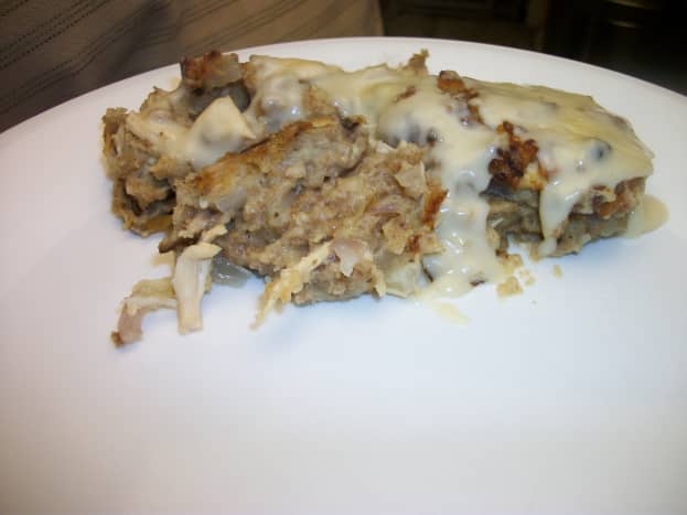 Chicken and dressing casserole with gravy.