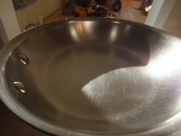 This is a small All-Clad frying pan I inherited from my mother a few years ago. It had scratches then and I've added some.