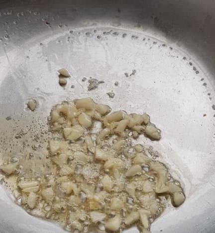 Saute Garlic in Small Amount of Oil Over Low Heat.