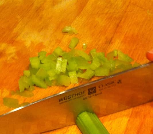 Finely chop celery