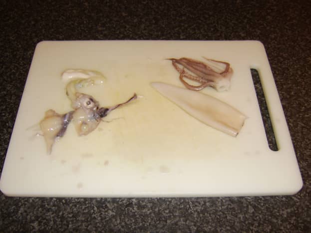 Cleaning calamari (squid)