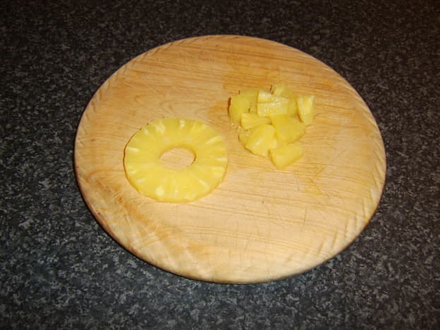 Drain and roughly chop the pineapple rings.