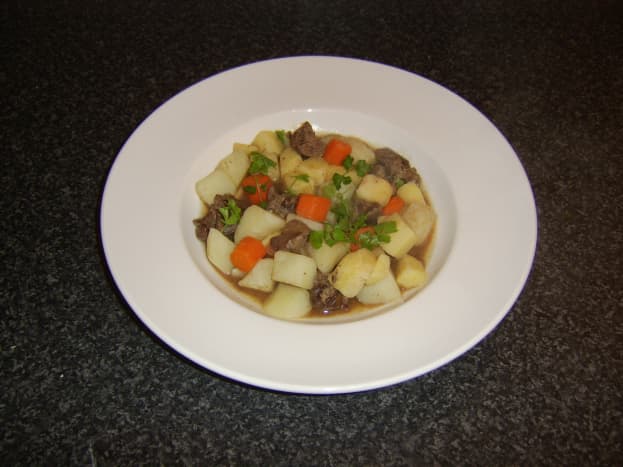 This one pot chicken liver and vegetable stew is served simply garnished with some freshly chopped parsley.