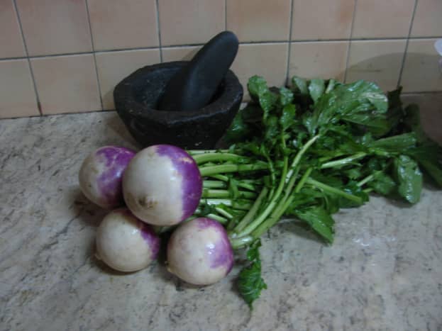 Turnips with the green tops still attached
