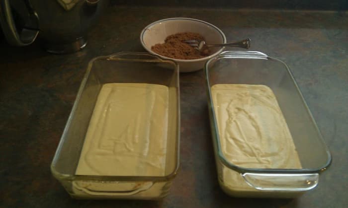 Half-filled loaf pans, ready for a layer of the sugar mixture.