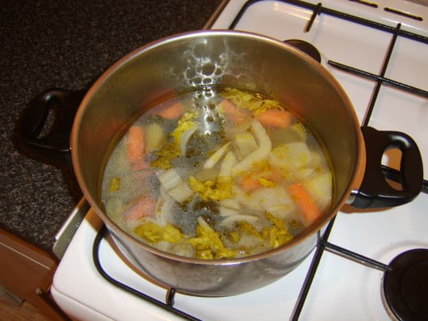 Vegetable stock has been simmered for half an hour and is ready to be strained.
