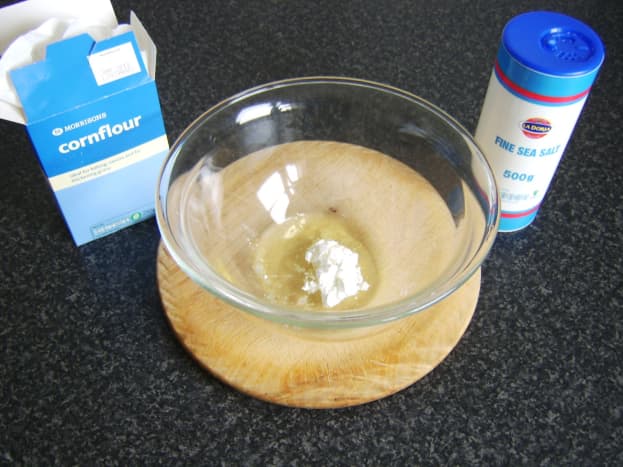 Salt and cornflour/starch are added to egg white