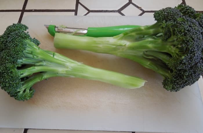 Wash, dry,  and peel broccoli to remove tough exterior of stalks.