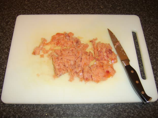 Smoked salmon is roughly chopped