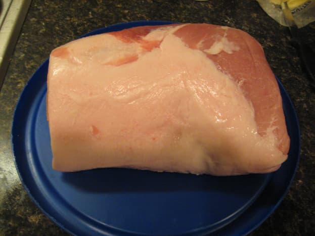 Rinse the pork loin roast and pat it dry.