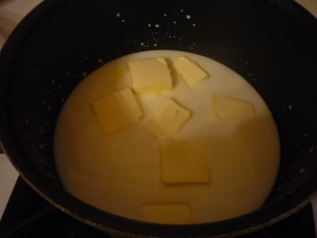 Warm the butter and milk in a saucepan on the stove.