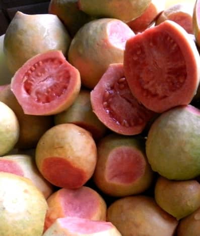 Peel guavas first if you want to cook the shells. For nectar cut shells in half and scoop out the pulp.