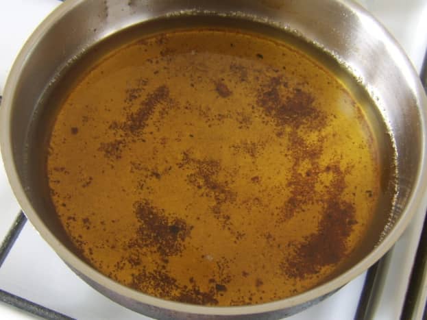 Burned breadcrumbs in vegetable oil