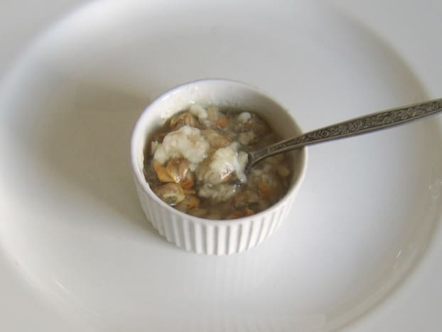 Jellied conger eel and cockles enjoyed simply with malt vinegar and white pepper seasoning
