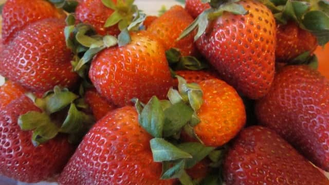 Fresh strawberries make a beautiful fruit salad creation.
