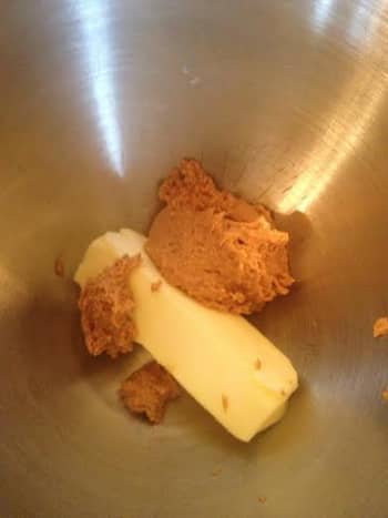 Preheat the oven to 350 degrees.  Combine the ground peanuts and butter in the mixing bowl.