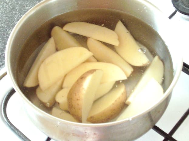 Potato wedges are firstly parboiled