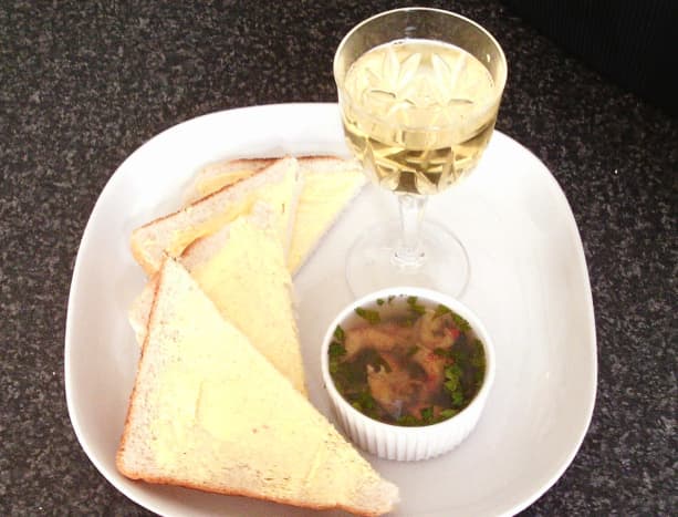 Coriander and lime potted crayfish tails with bread, butter and white wine