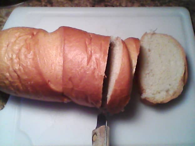Prep Work:  Slicing the French bread with serrated knife.