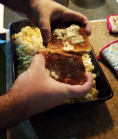 Top with bread crumbs, if desired. To make your own, slide two pieces of toast against each other over top of the macaroni. 