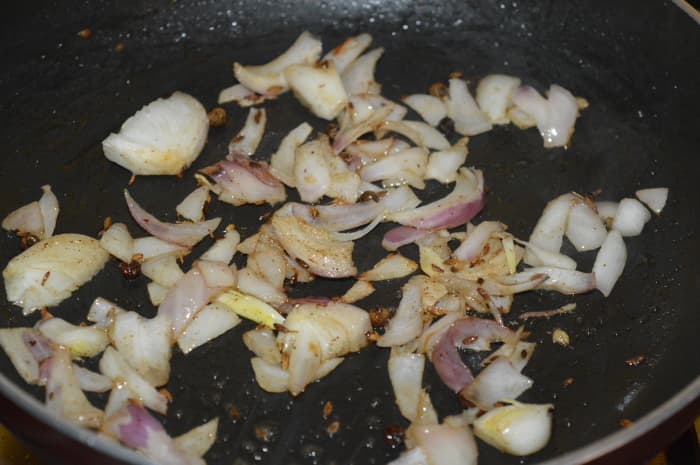 Step one: Saute cumin seeds and pepper corn in butter or oil. Cumin crackles. Add chopped onions. Saute till they become pinkish and transparent.