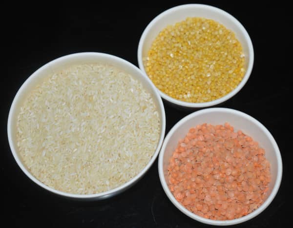 Measure the rice, red lentils, and mung beans split (moong dal).