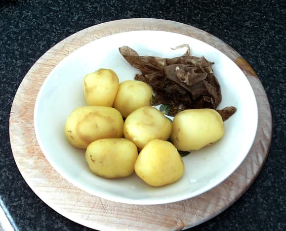 Boiled and peeled baby potatoes