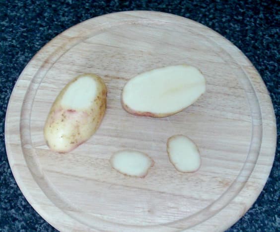 Potato is halved and trimmed
