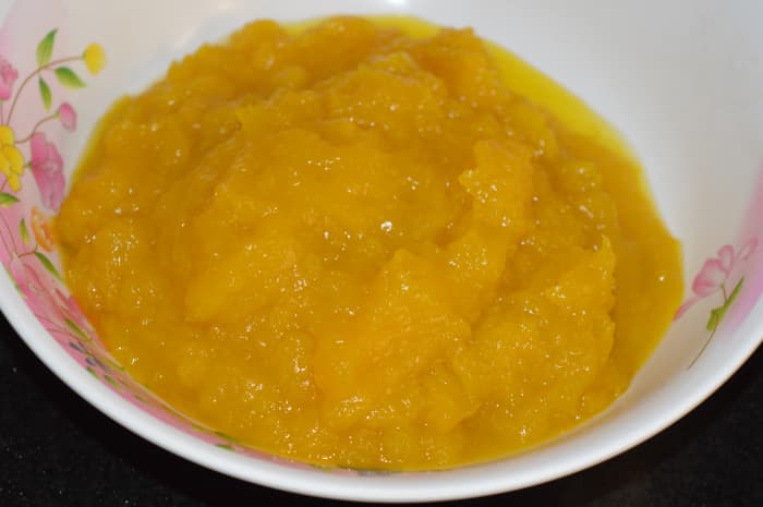 Step one: Boil yellow pumpkin and mash. Collect the pulp in a mixing bowl.