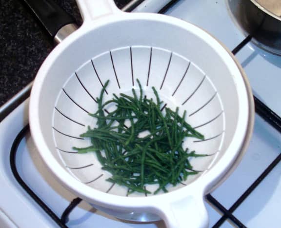 Blanched samphire is drained and left to cool