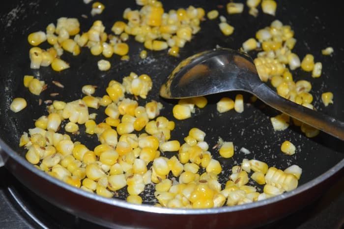 Step one: Saute cumin seeds and sweet corn in butter or olive oil for 2 minutes as per instructions.
