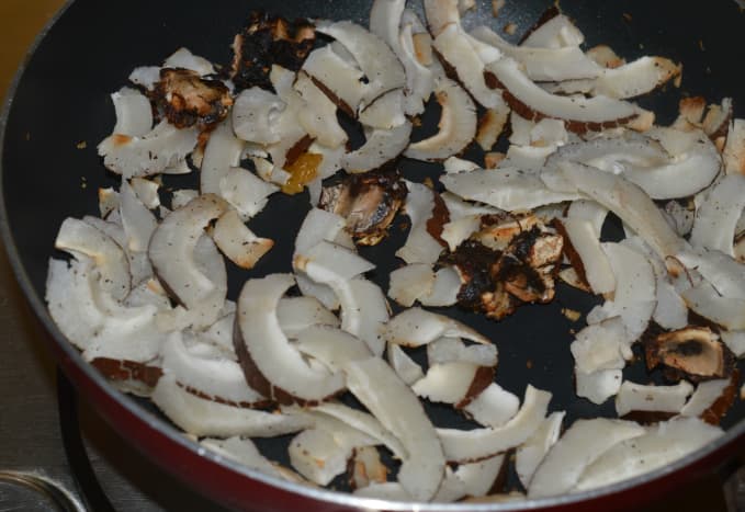 Step one: Saute thinly sliced copra (dry coconut) and tamarind till they become crispy. Transfer them to a plate.