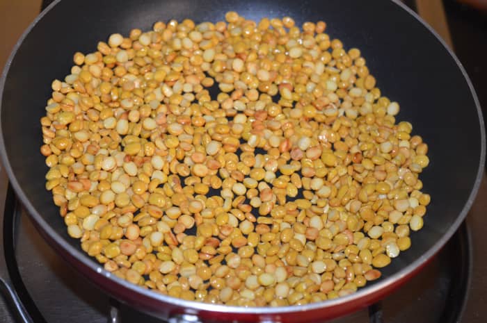 Step one: Roast split chickpea till golden brown. Transfer it to a large bowl.