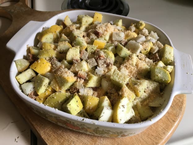 Add white pepper, savory and parmesan cheese. Stir well and pour contents of bowl into a casserole dish that has been coated with non-stick spray