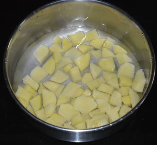 Step one: Boil potato cubes in water till they become soft. Mash them. Set aside.