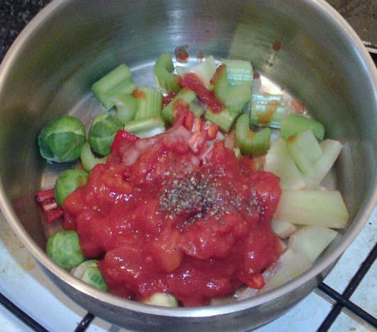 Solid soup ingredients are prepared and added to pot