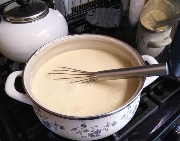 Milk may become frothy as you whisk. Heat gently until it bubbles, stirring often all over the bottom of the saucepan. Boil 1 minute.