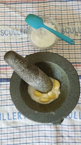 Pound salt and garlic to a smooth paste with a mortar and pestle.