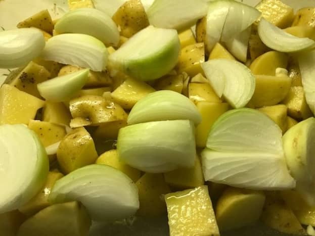 Chopped onions and potatoes before seasoning