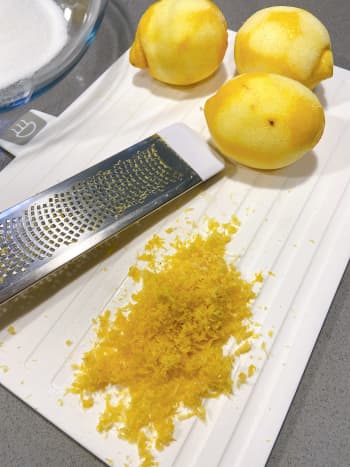 Freshly grated lemons. The citrus smell is just so good. Later, squeeze one lemon to make the lemon glaze. 