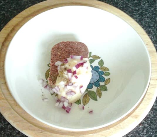 Horseradish sauce and chopped onion is added to corned beef